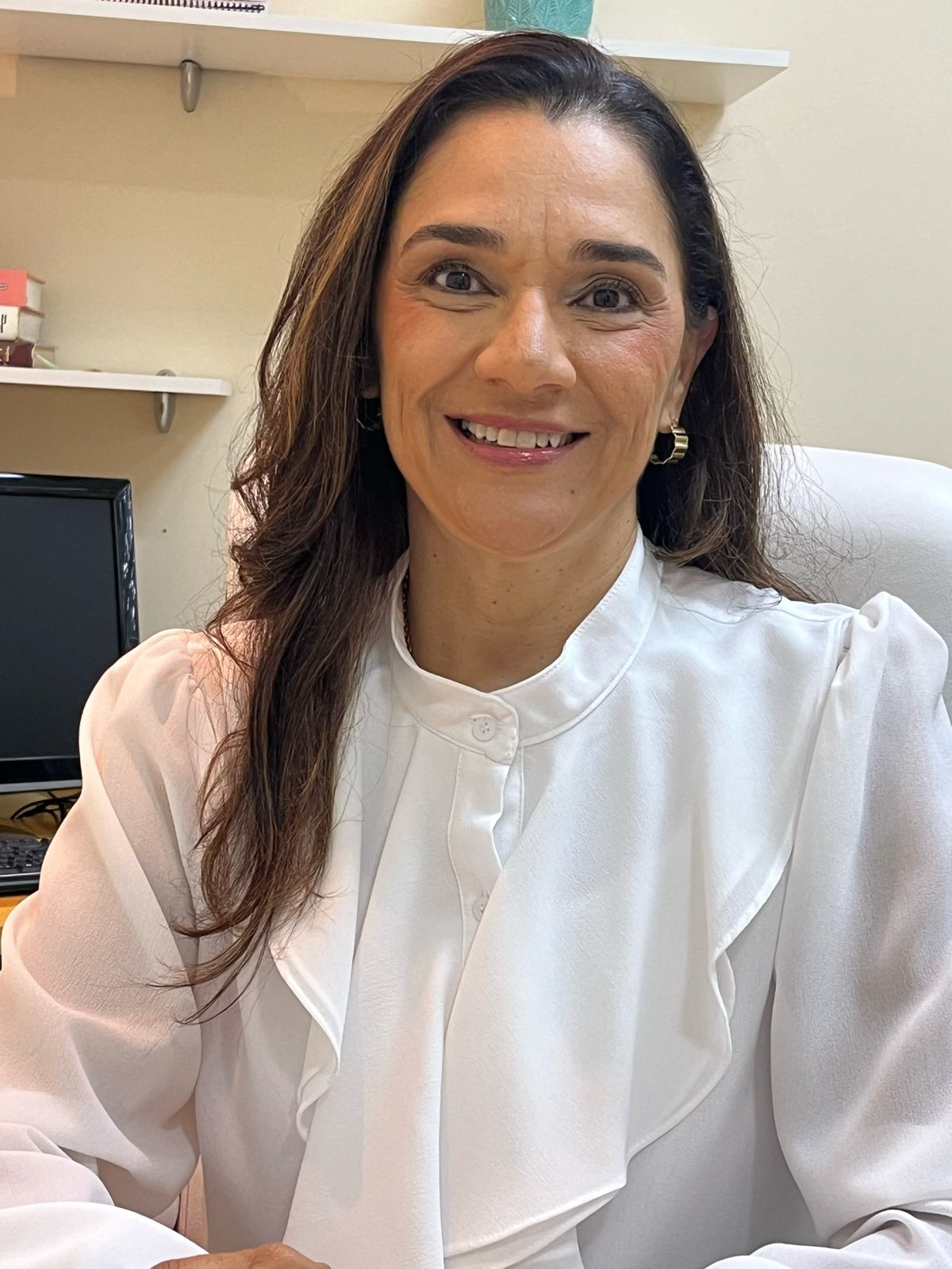 Foto profissional da Dra. Neliane Teixeira